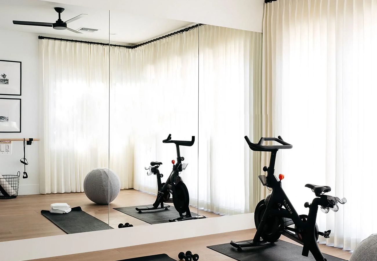 Wall of mirrors in a home gym