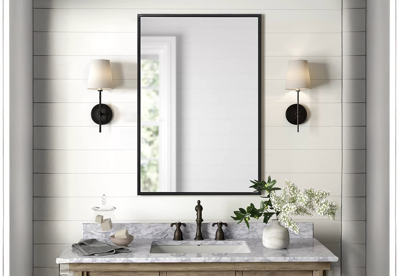 A stylish framed mirror in a living space