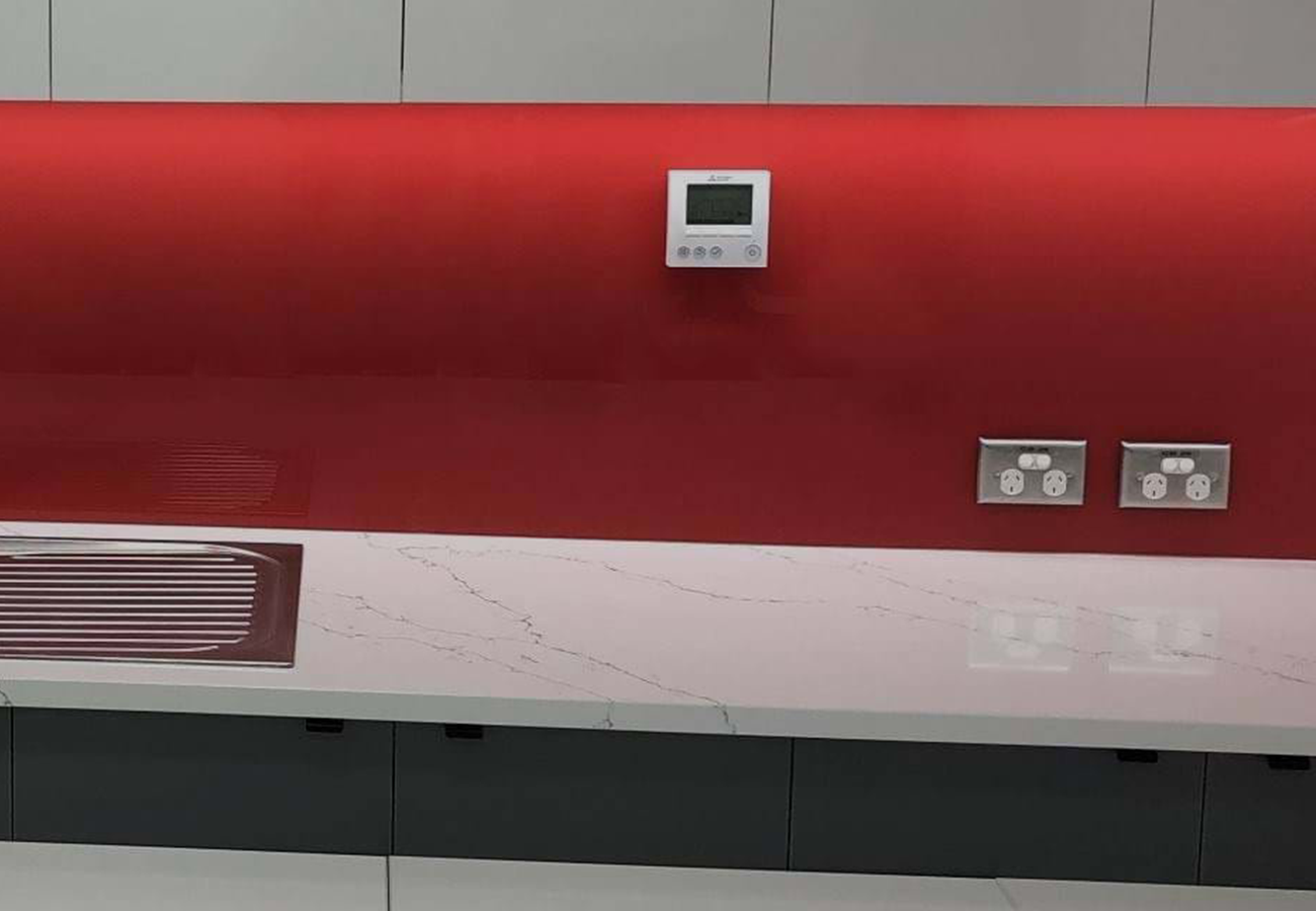 A splashback with a cutout for a power point