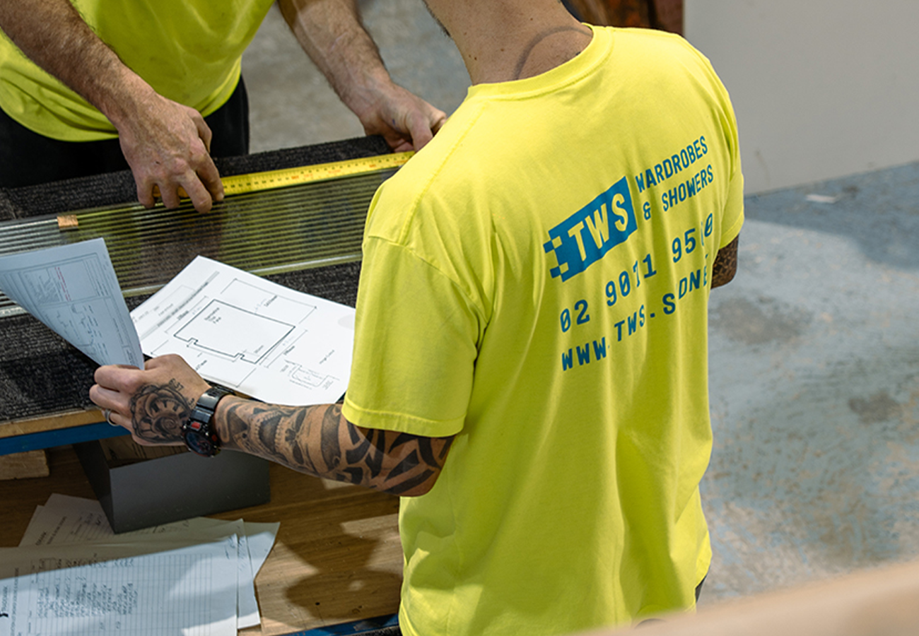 A friendly TWS team member consulting with a homeowner.